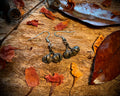 Handmade copper seed pod earrings from the Northern Territory