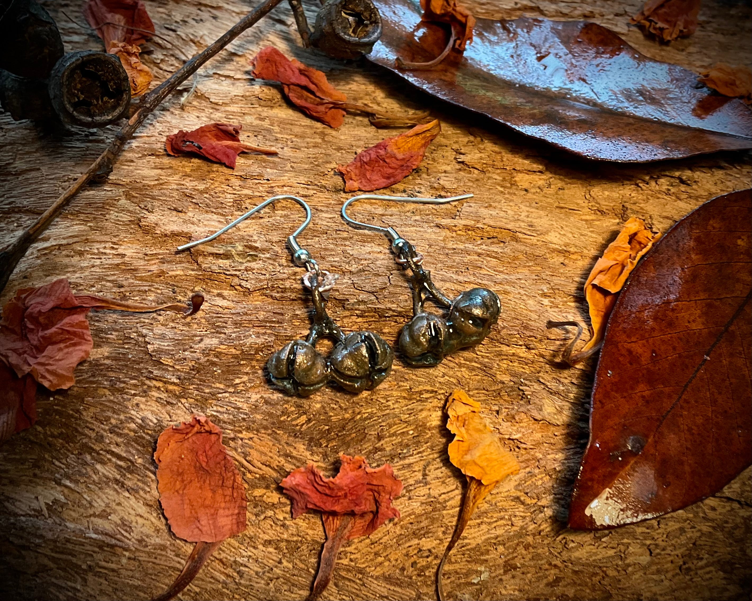 Handmade copper seed pod earrings from the Northern Territory