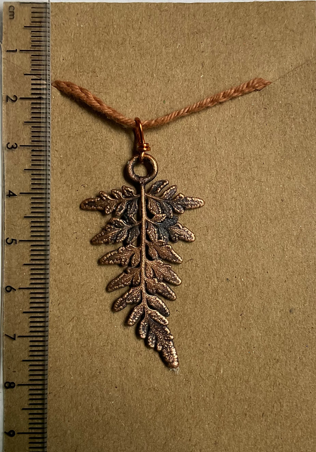 Handmade copper fern pendant from the Northern Territory