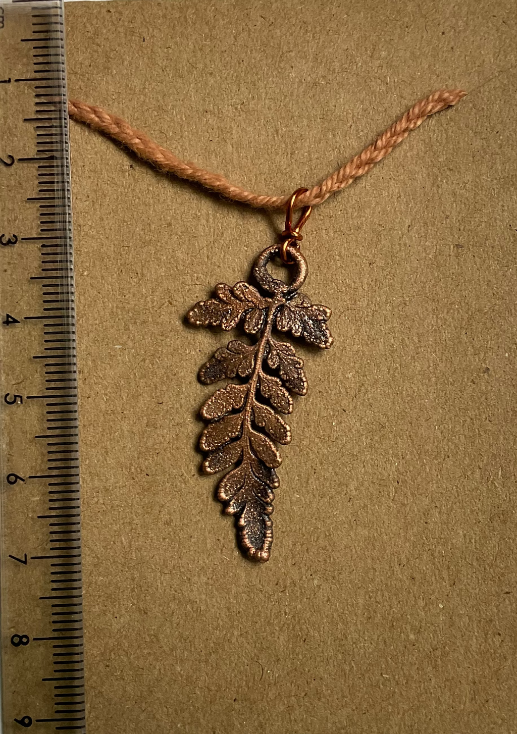 Handmade copper fern pendant from the Northern Territory