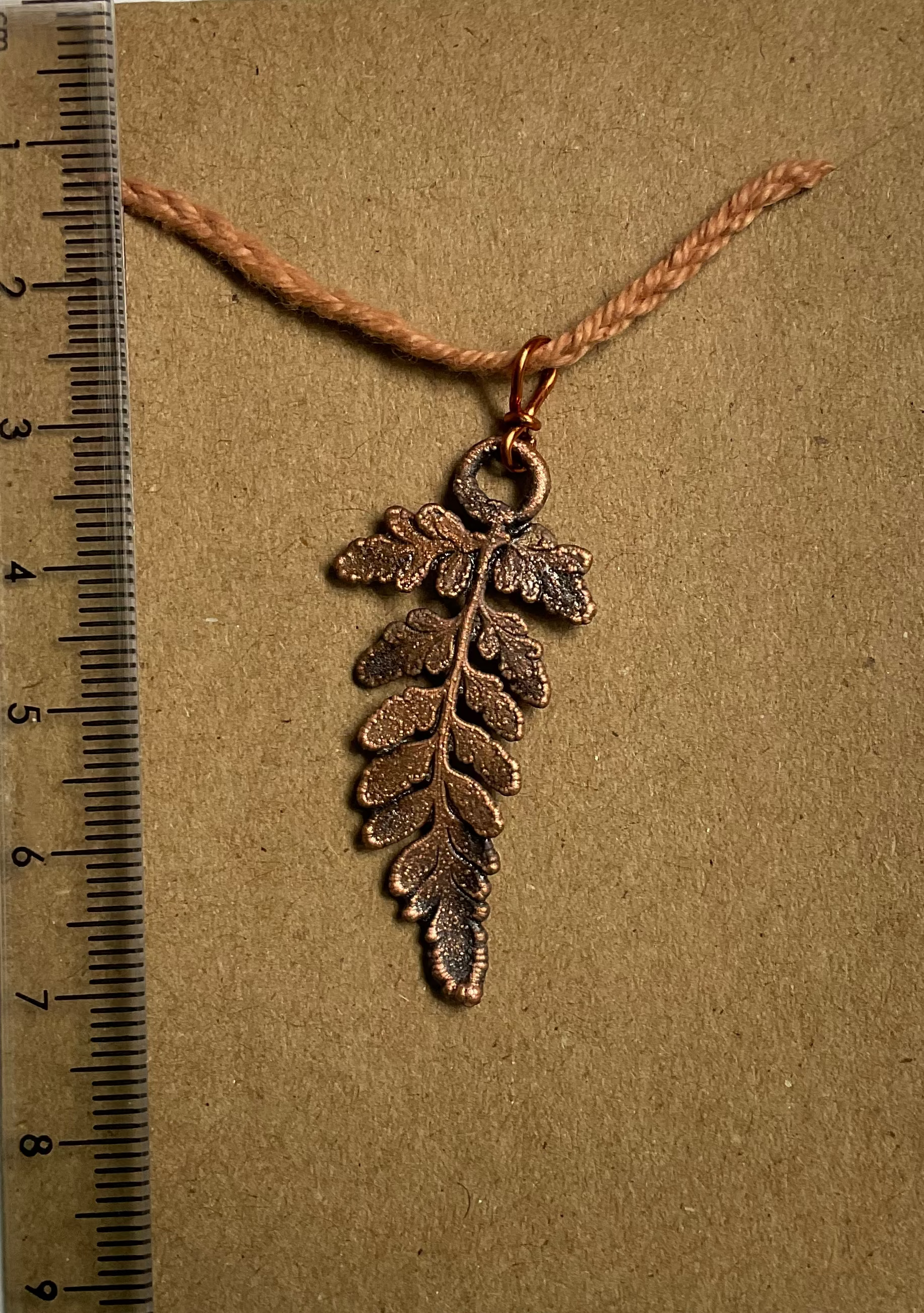 Handmade copper fern pendant from the Northern Territory