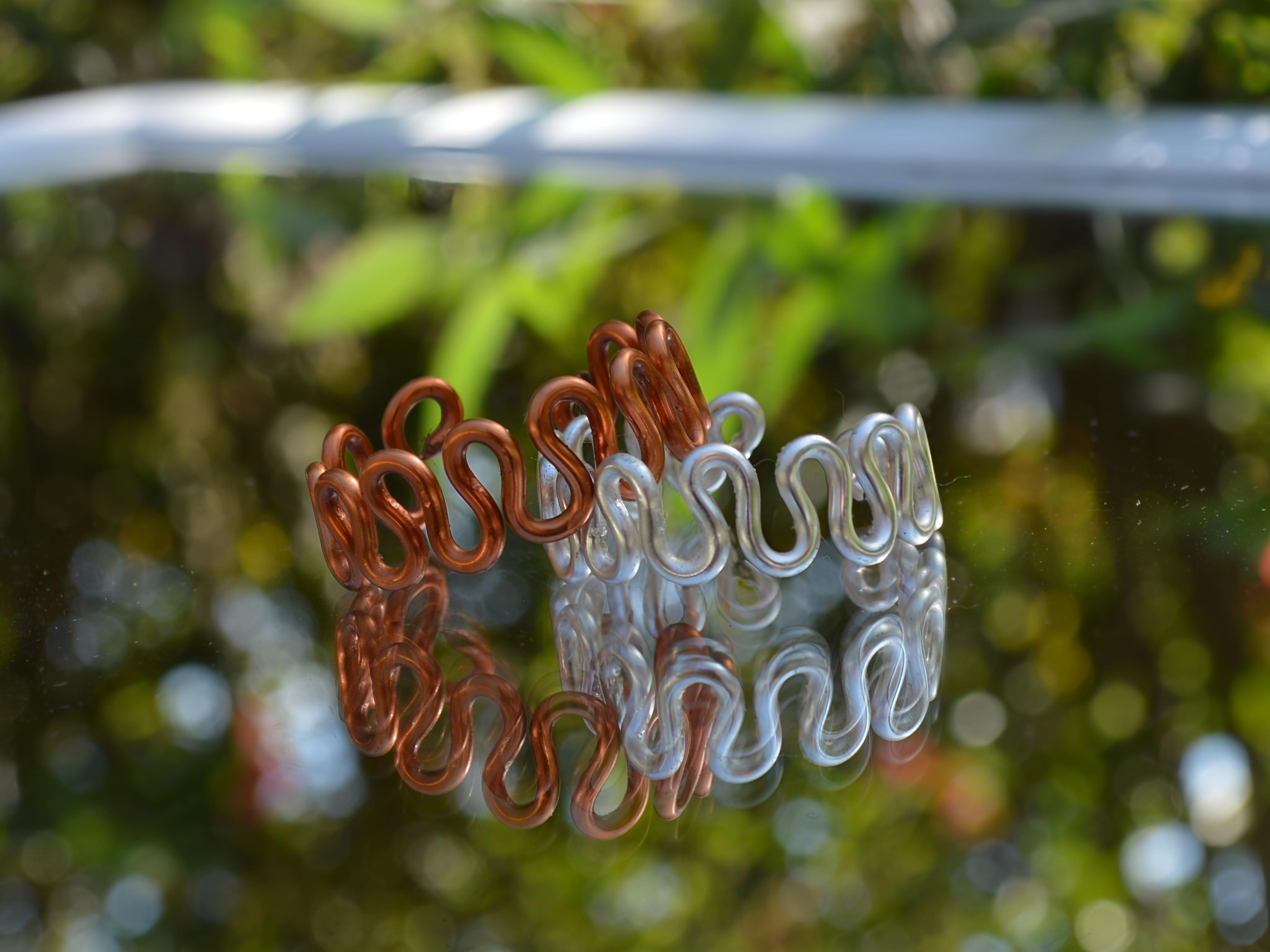 Adjustable squiggle ring