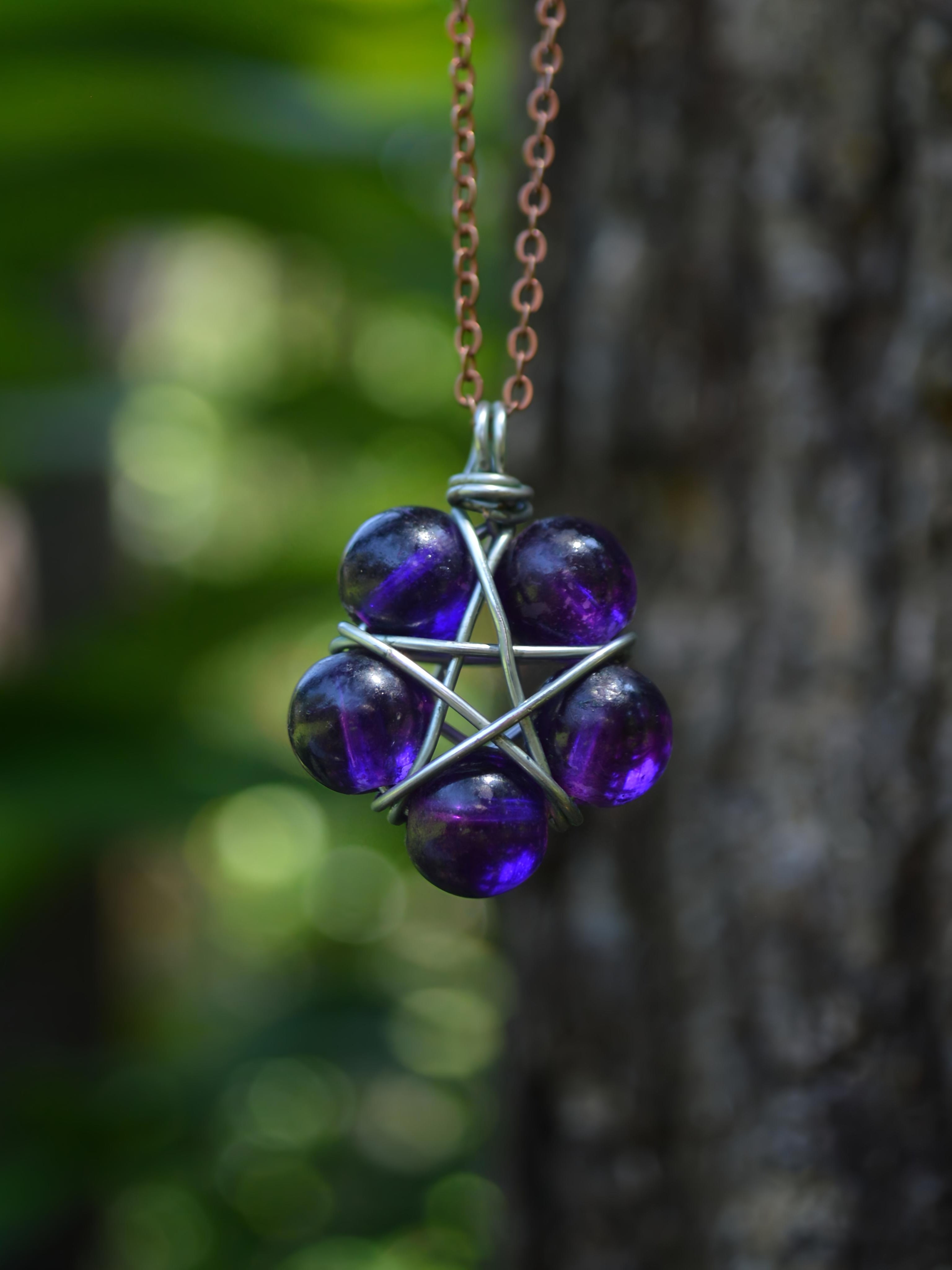 Wire-wrapped purple star pendant